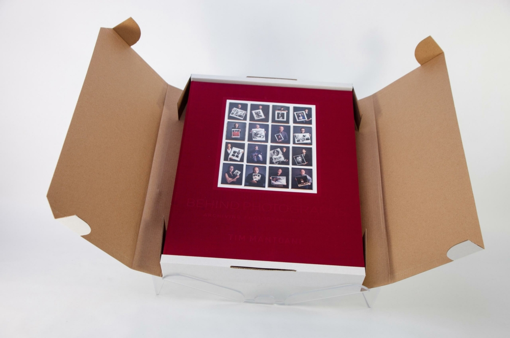 44138 MG 9556 clamshell box, cloth casewrap, tip-on, deep blind debossing, coffee table book, hardcover book, corrugated mailer box, bumper box